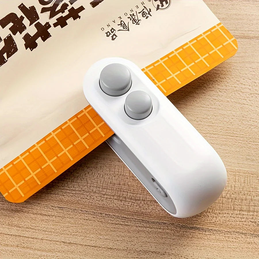 2-in-1 Mini Heat Sealing Machine | USB Rechargeable Handheld Food Bag Sealer & Cutter for Snacks, Chips & Fresh Storage.